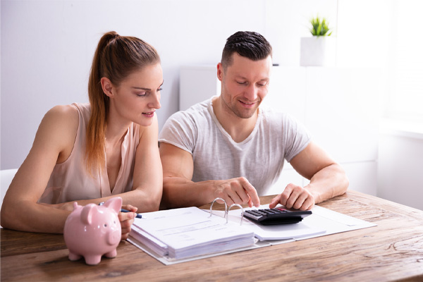 image of couple calculating savings after using ecoblend bioheat