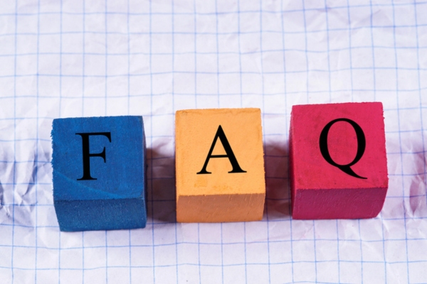 FAQ spelled using wooden letter cubes depicting HVAC Emergencies Common Questions