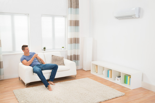 image of a man enjoying his ductless split system