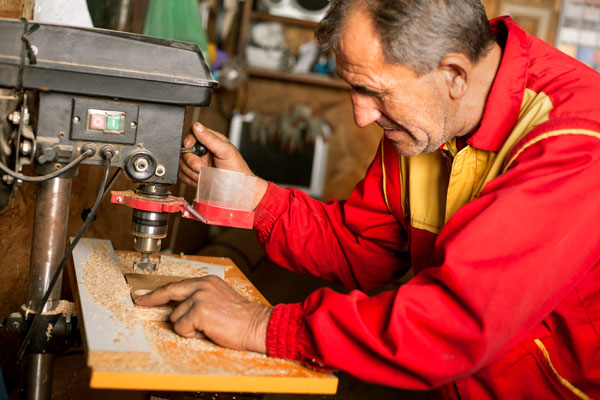 man working in home garage