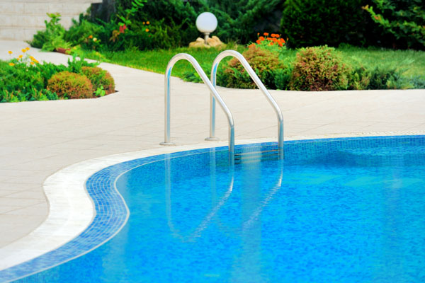 image of a pool with a pool heater replacement