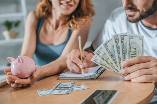 image of couple calculating savings on furnace repair