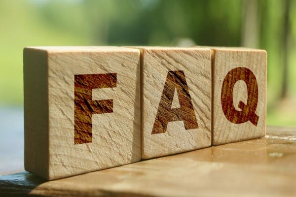 FAQ spelled using wooden letter cubes depicting questions about Improving Indoor Air Quality
