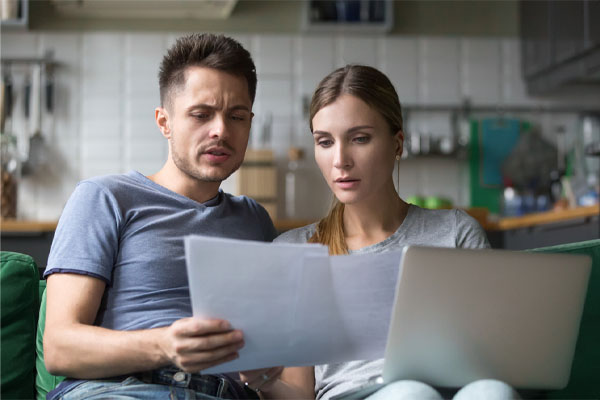 image of couple looking at hvac repair costs