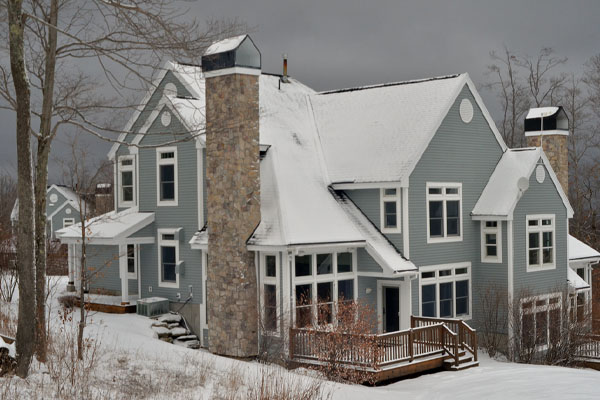 house in winter that uses heating oil