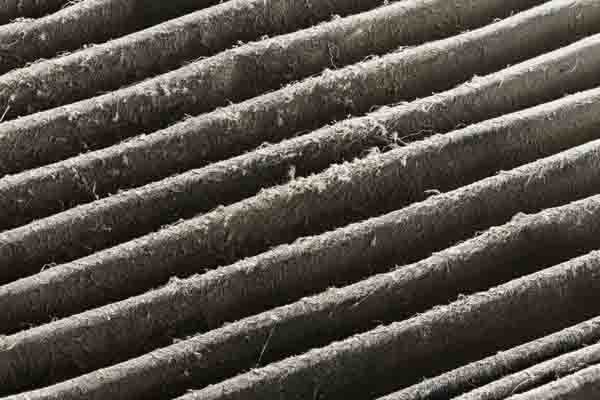 image of a dirty air filter for an air conditioner causing air conditioner short cycling