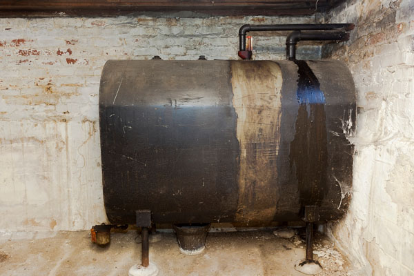 image of an old and rusty heating oil tank