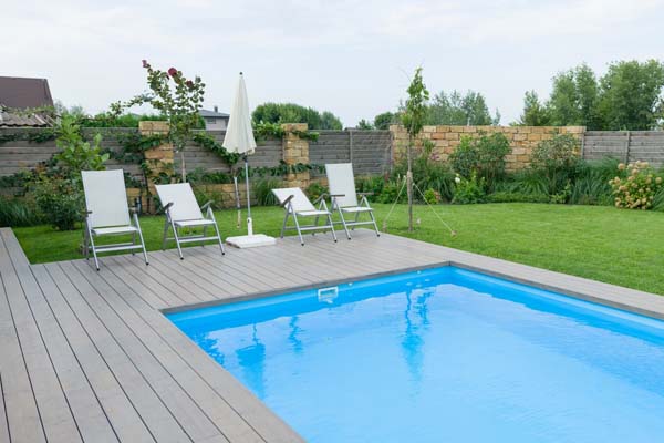 image of an outdoor pool with a heater in new york home