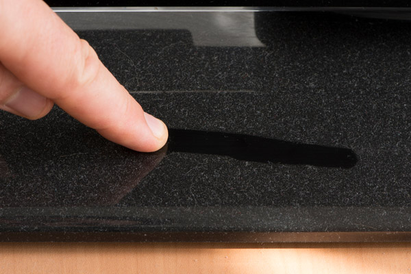 image of dust on furniture depicting hvac ductwork leaks