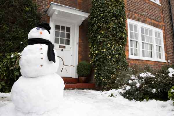 house in winter that uses heating oil