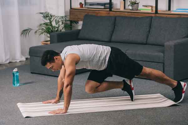 image of a homeowner working out at home to generate heat