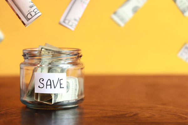save jar depicting saving money with a ductless cooling system