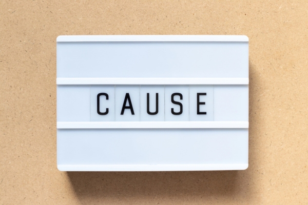 White lightbox with word cause on wood background depicting frozen air conditioner
