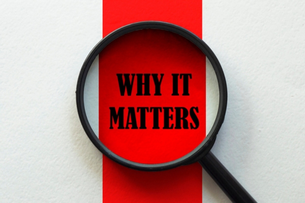 Magnifier with text Why It Matters on white and red background depicting Heating System Efficiency Standards