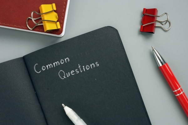 common questions written on a black notebook depicting FAQs about AFUE vs AFUE2