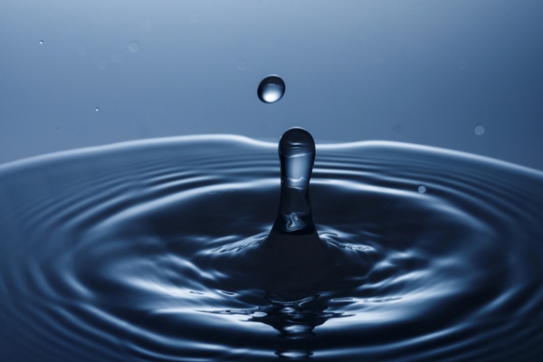 water drop and splash depicting cooled water