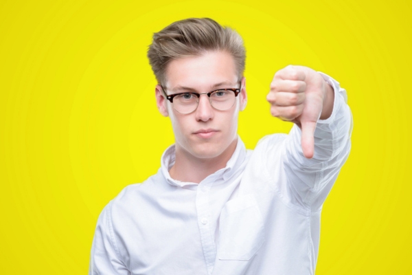 image of a man doing a thumbs down depicting Letting Your Oil Tank Empty Causes No Damage myth
