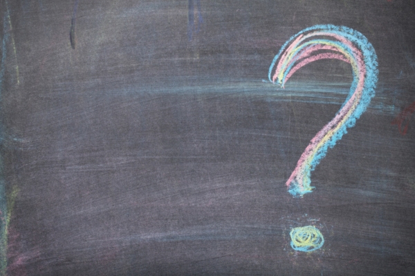 question mark drawn on a chalkboard depicting Boiler Efficiency FAQs