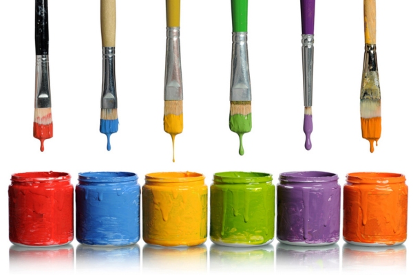 Paintbrushes Dripping into Paint Containers depicting diesel color