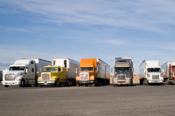 image of diesel powered trucks parked in a row
