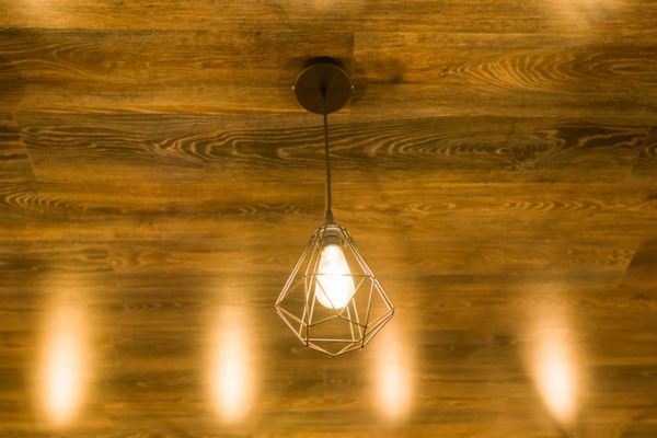 geometric lamp on home's ceiling