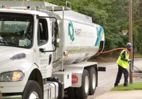 Hart Home Comfort heating oil delivery truck and staff